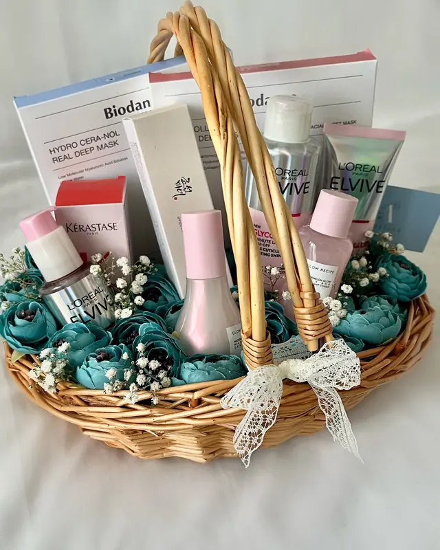 Blue rose gift basket with skincare by Amorella Flower Boutique