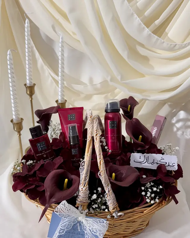 Burgundy calla lily gift basket with perfume by Amorella Flower Boutique