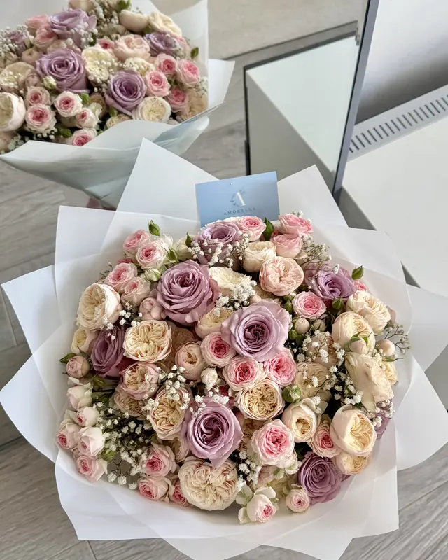 Lilac and cream rose bouquets with gypsophila by Amorella Flower Boutique