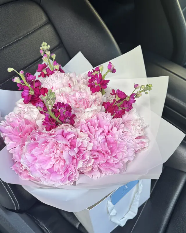 Pink hydrangea and stock bouquet by Amorella Flower Boutique