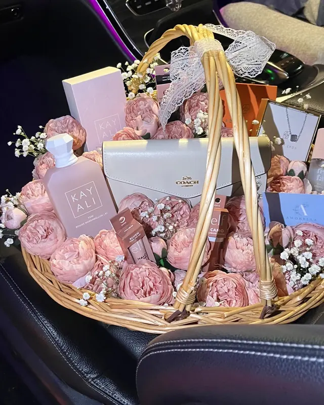 Pink rose gift basket with perfume and beauty gifts by Amorella Flower Boutique
