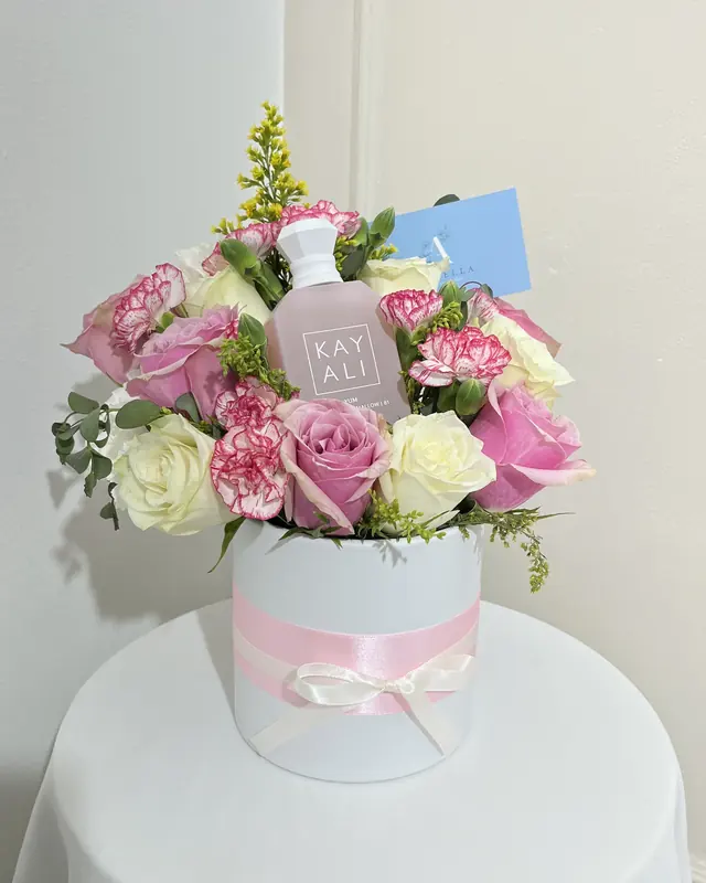Pink rose hatbox with a perfume gift by Amorella Flower Boutique