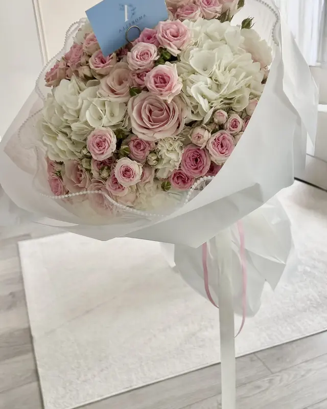 Pink spray rose and white hydrangea bouquet by Amorella Flower Boutique