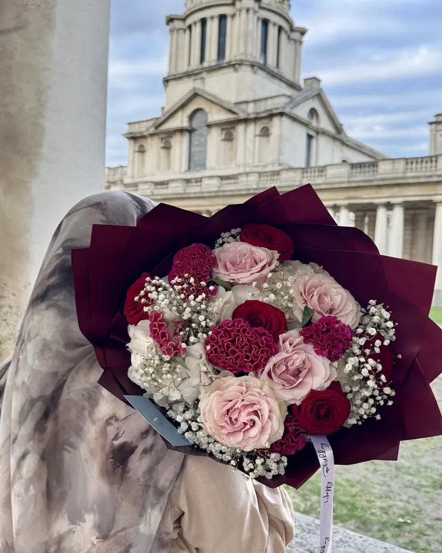 Red and pink rose bouquet in Greenwich by Amorella Flower Boutique