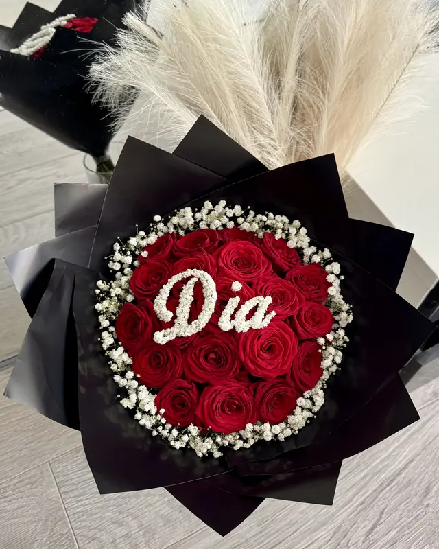 Red rose bouquet with a personalised name and pampas grass by Amorella Flower Boutique