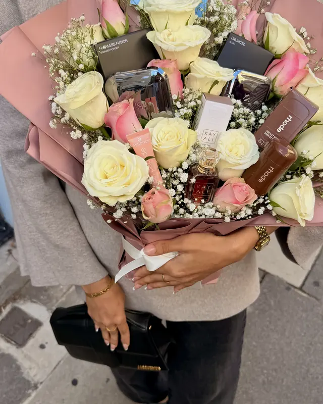 Large rose and tulip bouquet with beauty gifts by Amorella Flower Boutique