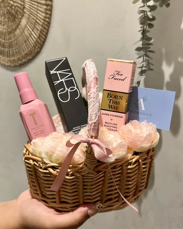Small flower gift basket with makeup by Amorella Flower Boutique