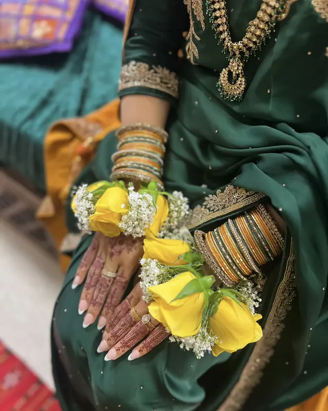 Yellow rose gajras for a bride by Amorella Flower Boutique
